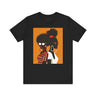Two Black Women silhouette wearing fashionable eyewear on an orange background, featured on an Afrocentric unisex tee shirt