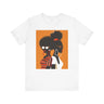 Two Black Women silhouette wearing fashionable eyewear on an orange background, featured on an Afrocentric unisex tee shirt