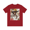 Black Cowgirl Tee featuring a cartoon-style brown skin girl in a graffiti-inspired pop art design. An edgy Afrocentric Western shirt celebrating African American culture and bold streetwear fashion.