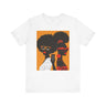 They Not Like Us Tee Shirt featuring two Black women in silhouette wearing high-fashion eyewear, holding a cell phone with the phrase "They Not Like Us" on an orange background – Afrocentric unisex apparel.