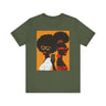 They Not Like Us Tee Shirt featuring two Black women in silhouette wearing high-fashion eyewear, holding a cell phone with the phrase "They Not Like Us" on an orange background – Afrocentric unisex apparel.
