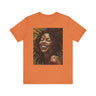 Afro Locs Girl Tee in orange.