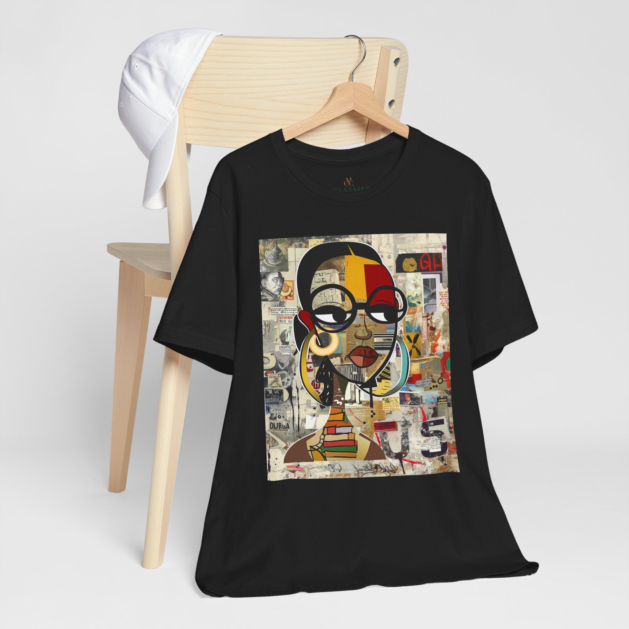 Boss Babe graphic tee featuring an abstract cartoon-style Black woman with large round black eyeglasses. The design has a vibrant, graffiti-inspired aesthetic that celebrates African American beauty, confidence, and urban art style.