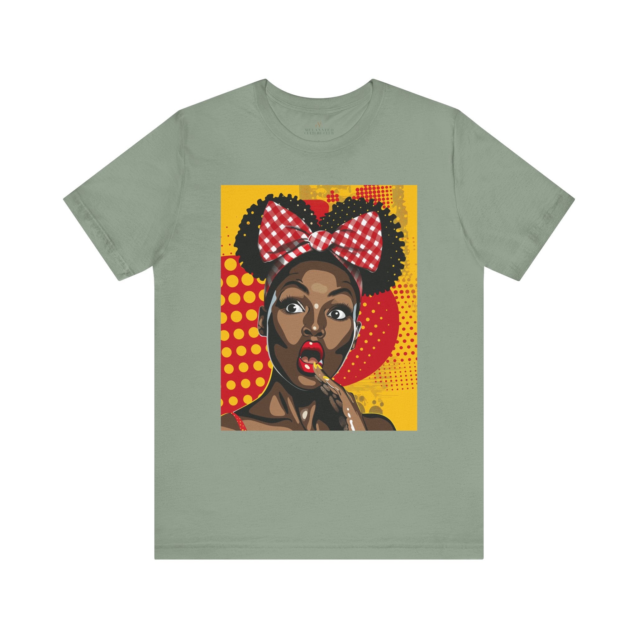 Black Girl Shocked Look Tee Shirt featuring a cartoon-style pop art illustration of a Black woman with natural hair and a red polka-dotted hair bow. Afrocentric graphic tee celebrating Black Girl Magic and expressive streetwear style.