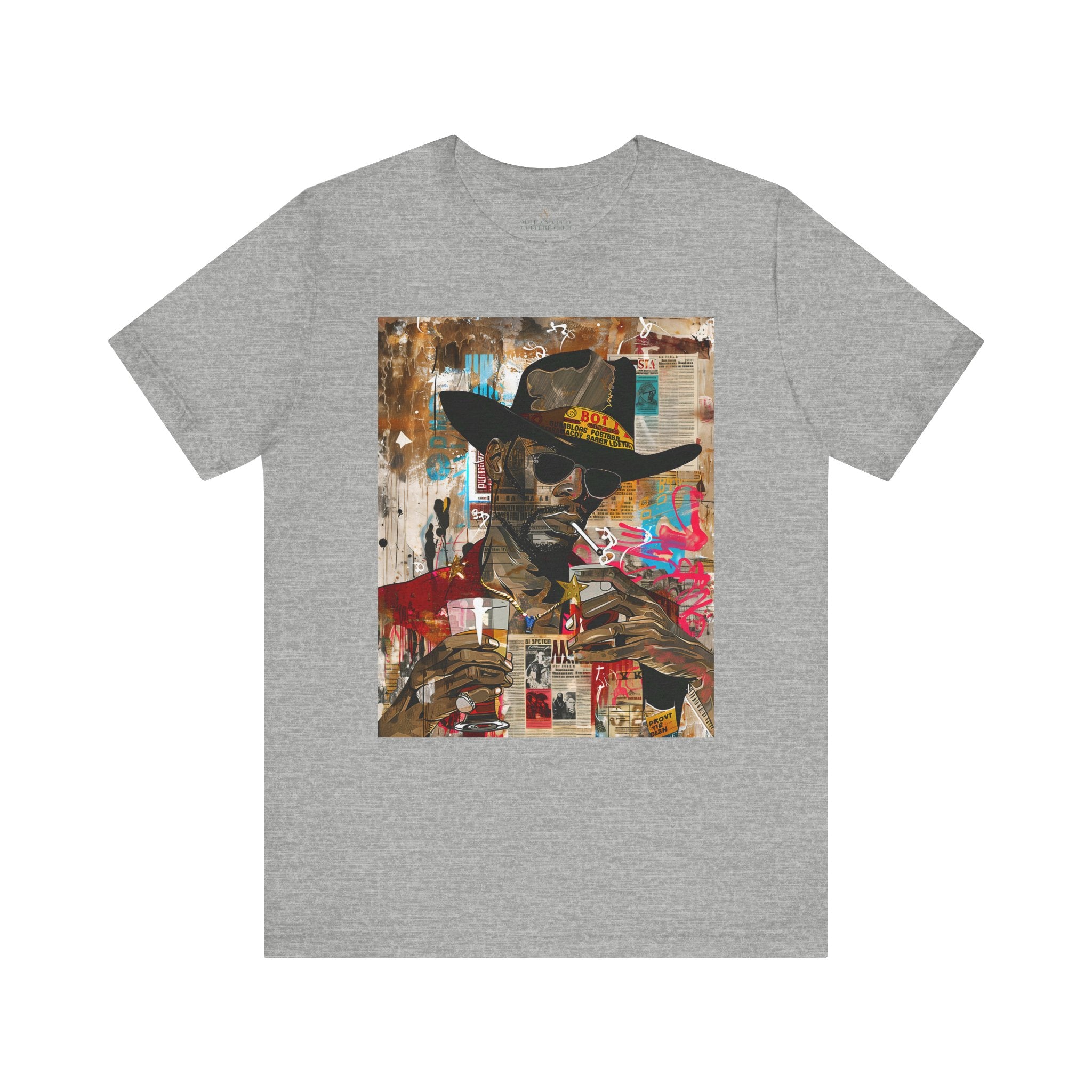 Urban Black Cowboy Tee featuring a graffiti collage design of an African American cowboy wearing dark sunglasses, smoking a cigarette, and holding a neat whiskey. A bold, edgy Afrocentric pop art-style shirt celebrating Black culture.