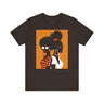 Two Black Women silhouette wearing fashionable eyewear on an orange background, featured on an Afrocentric unisex tee shirt