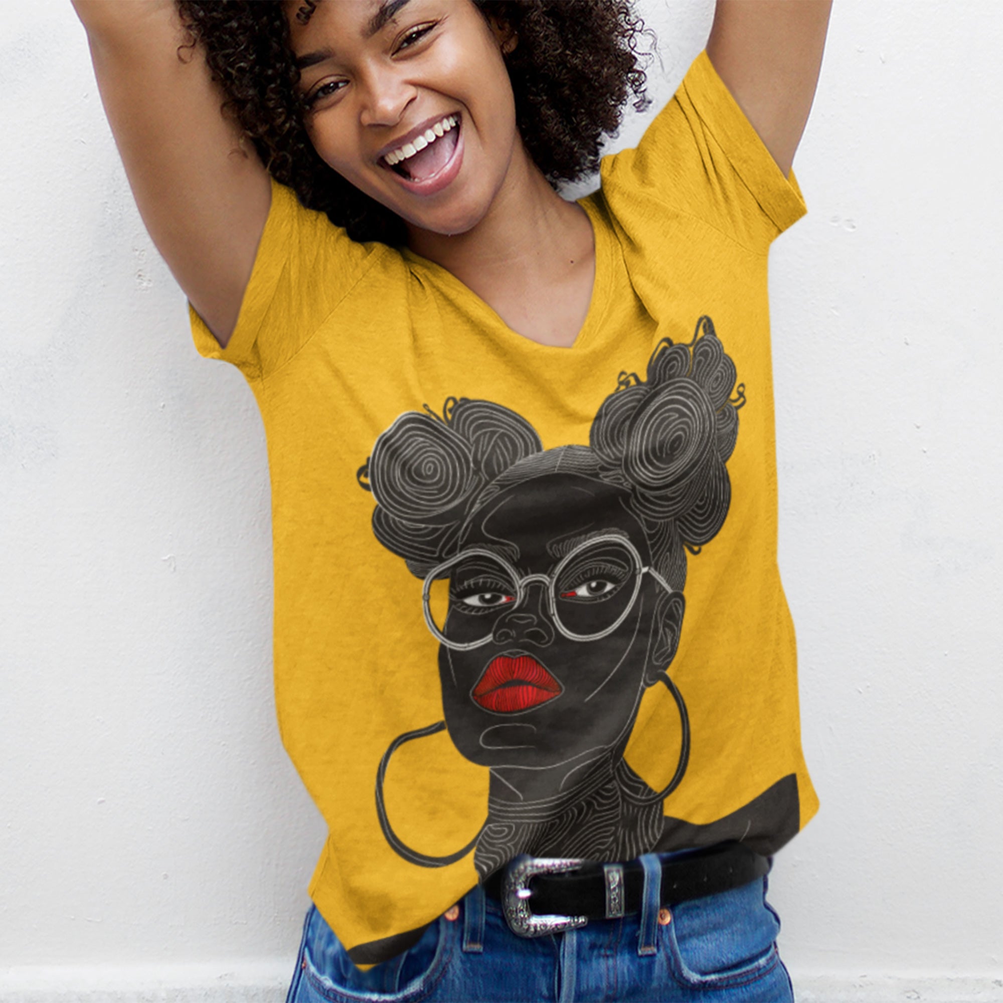 Black Girl Bantu Knots Tee Shirt featuring an Afrocentric design of a Black woman with natural hair, bold red lipstick, beautiful Black skin, and white wire-frame glasses. A stylish statement of culture and empowerment.