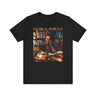 Black Girl Student Tee featuring a happy Black girl with dreadlocks studying in a library, surrounded by books. A stylish and empowering shirt celebrating Black college students and education.