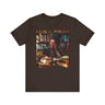 Black Girl Student Tee featuring a happy Black girl with dreadlocks studying in a library, surrounded by books. A stylish and empowering shirt celebrating Black college students and education.