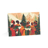 Christmas cards featuring African American holiday carolers and Black church choir singers in festive attire, available as a single card or boxed set with white envelopes.