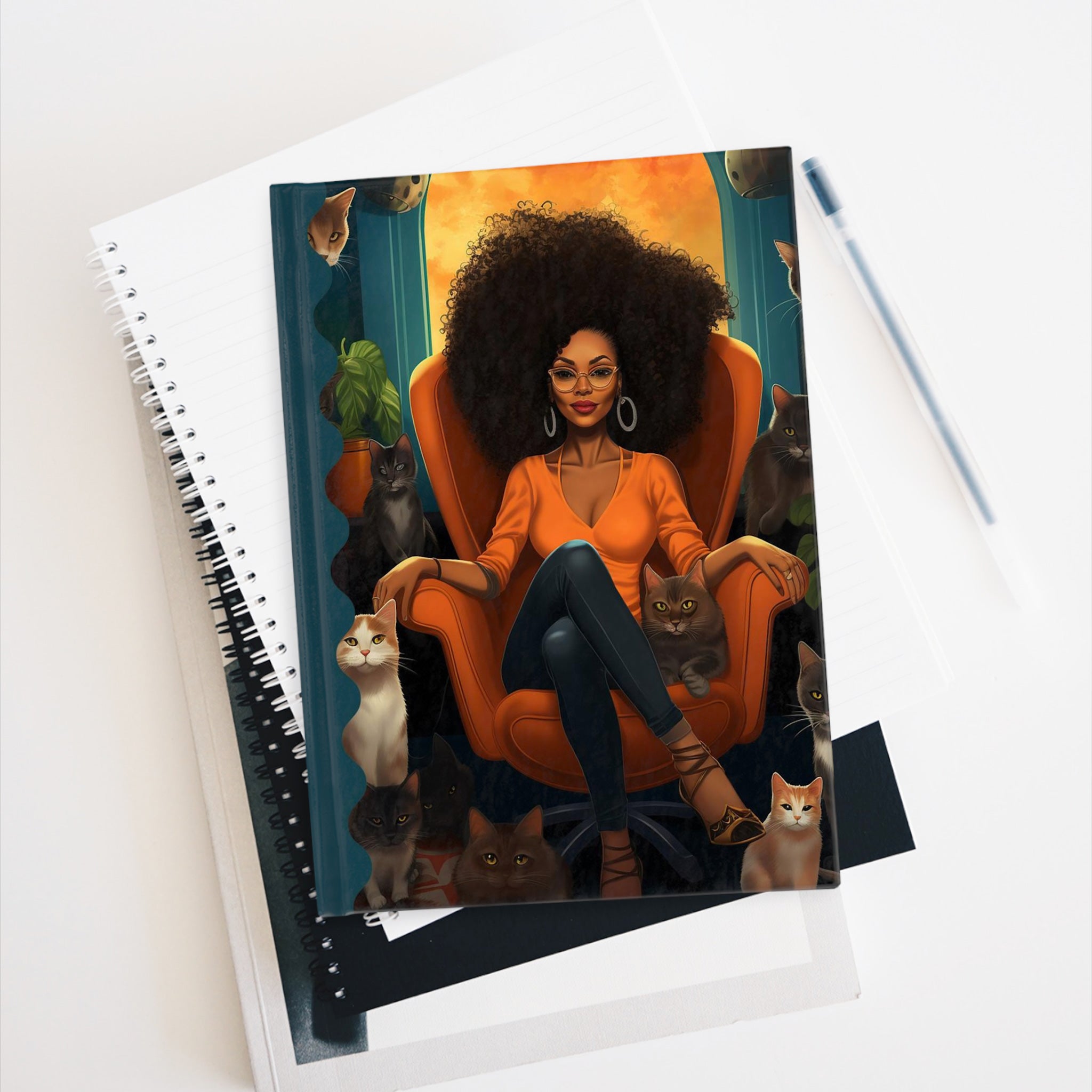 Black Woman Cat Lady Journal featuring an African American woman with big, beautiful Afro hair and her feline companions. A stylish writing journal perfect for cat moms, writers, and lovers of cats.