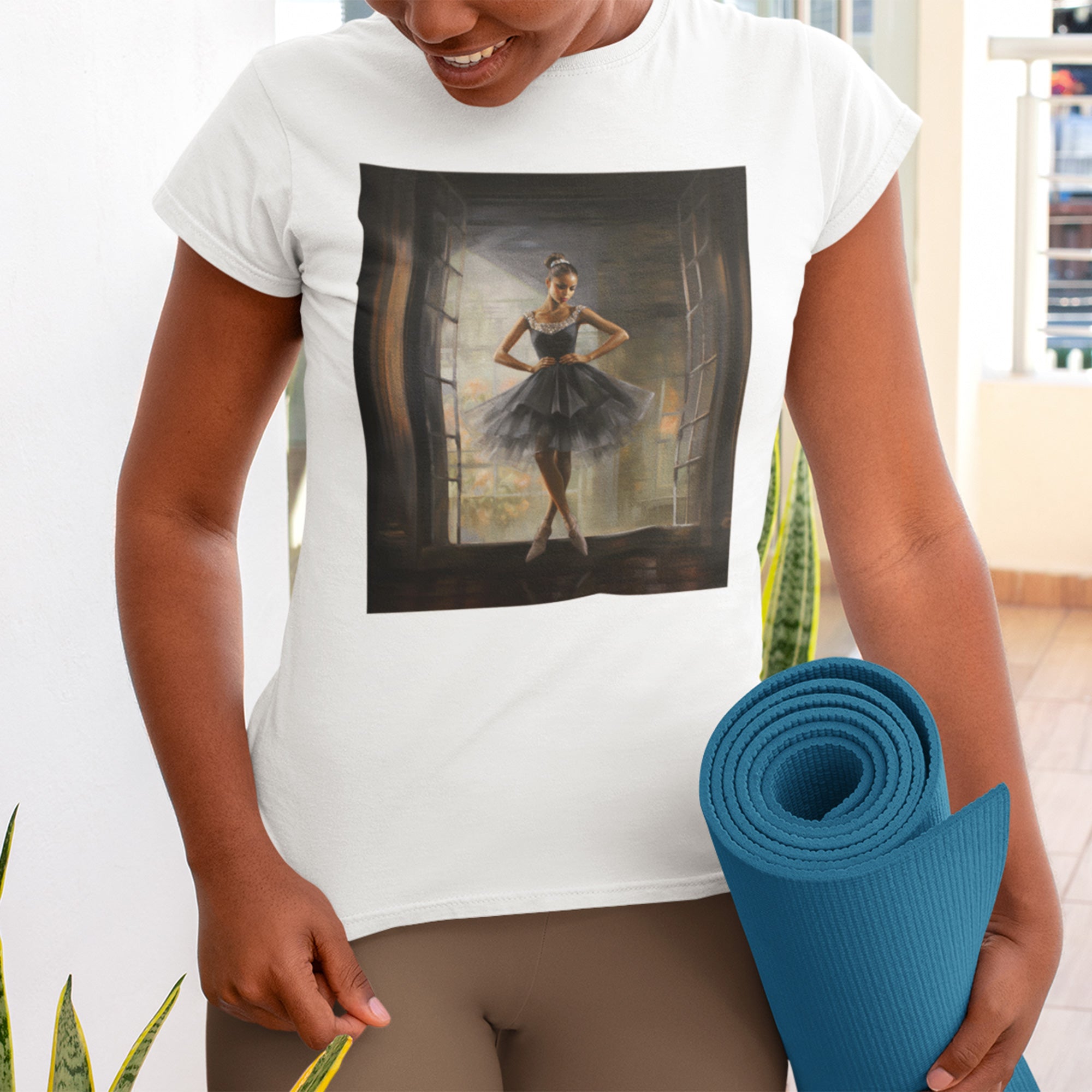 Black Ballerina Tee Shirt featuring an African American dancer, in a beautiful black tulle dress, celebrating brown skin girls in ballet. A perfect gift for ballet students, teachers, and Black girls who love to dance.