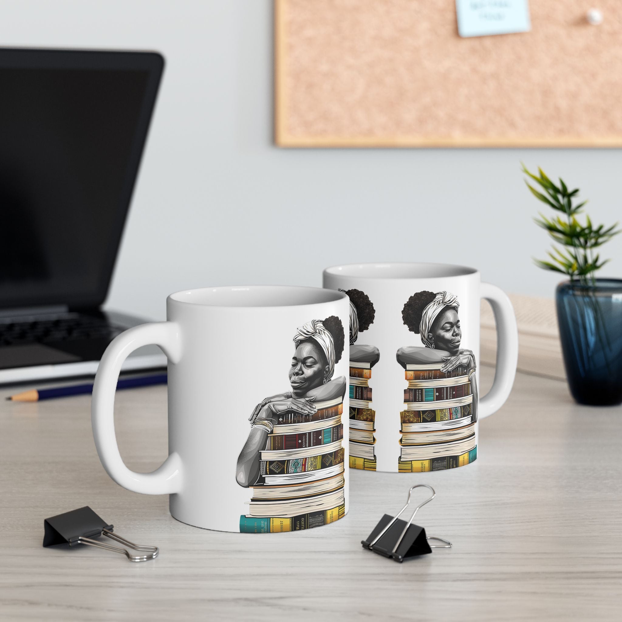White coffee mug featuring an Afrocentric illustration of a peaceful Black woman embracing books, symbolizing education, knowledge, freedom, and generational legacy.