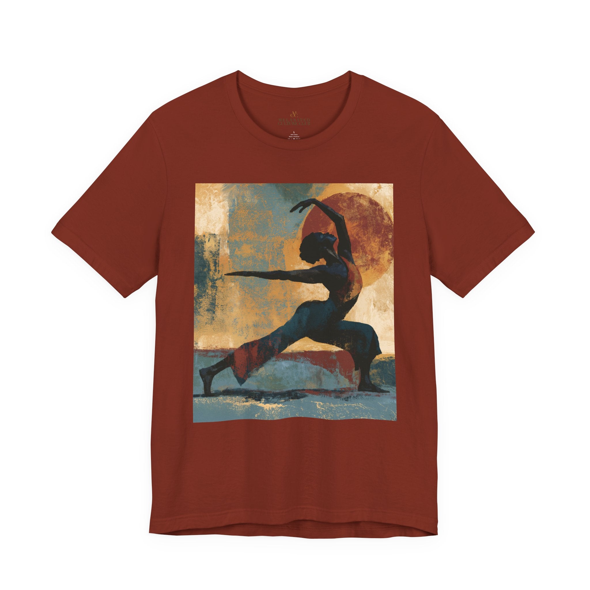 A rust colored short-sleeve crewneck t-shirt featuring a Black woman in a yoga pose against a warm, abstract sunset background.