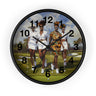 A round wall clock with a black frame and a printed face showing four Black women walking on a golf course. The clock has black Arabic numerals and black hands, photographed against a plain white background.