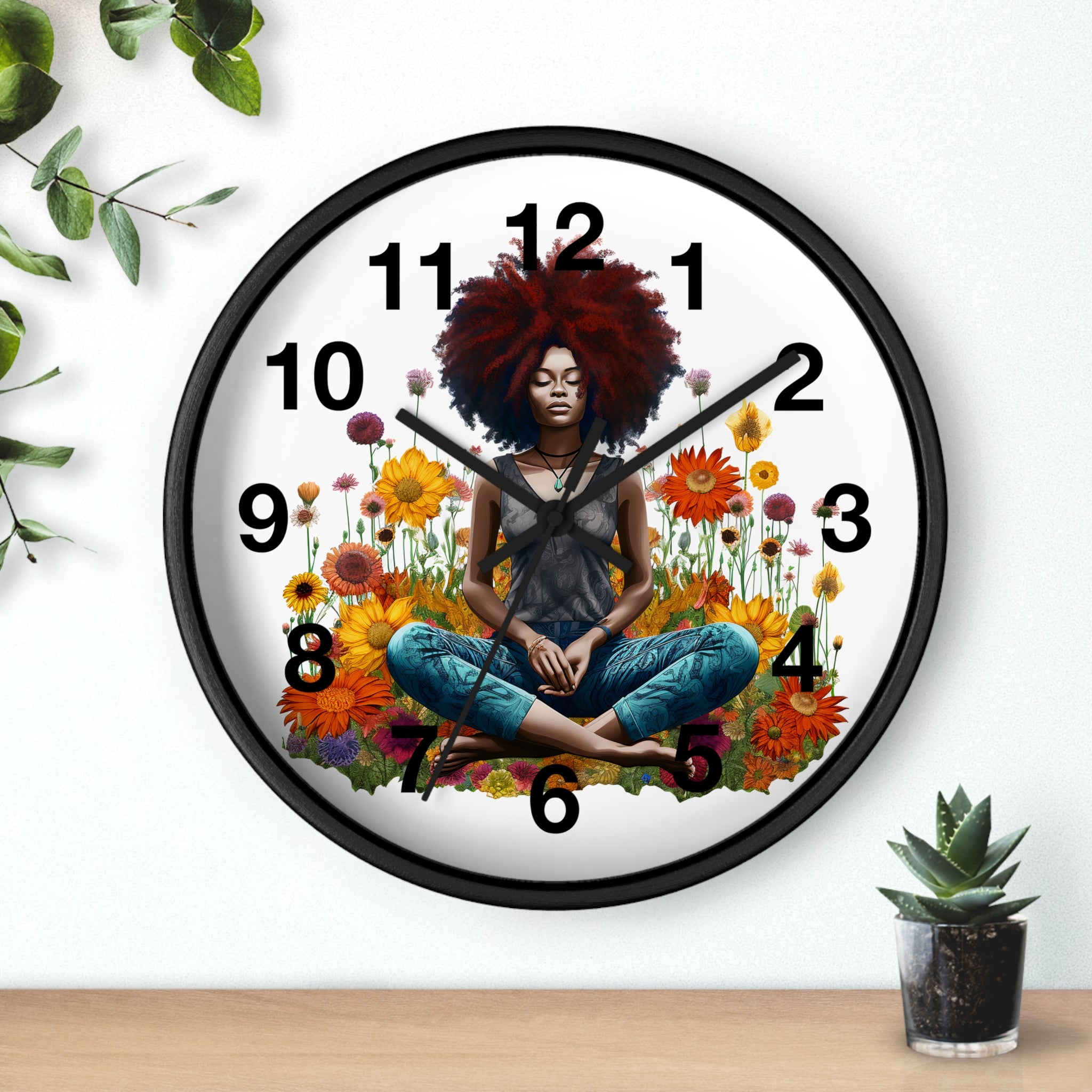 Black Female Yoga Round Wall Clock featuring an Afrocentric woman in meditation pose. Modern Yogi art clock for yoga studio, spa, or peaceful home decor.