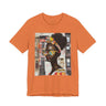 Boss Babe Kendra abstract graffiti T-shirt in burnt orange against a white background.