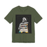 Afrocentric graphic tee shirt featuring a peaceful Black woman embracing a stack of books, symbolizing education, knowledge, freedom, and generational legacy.