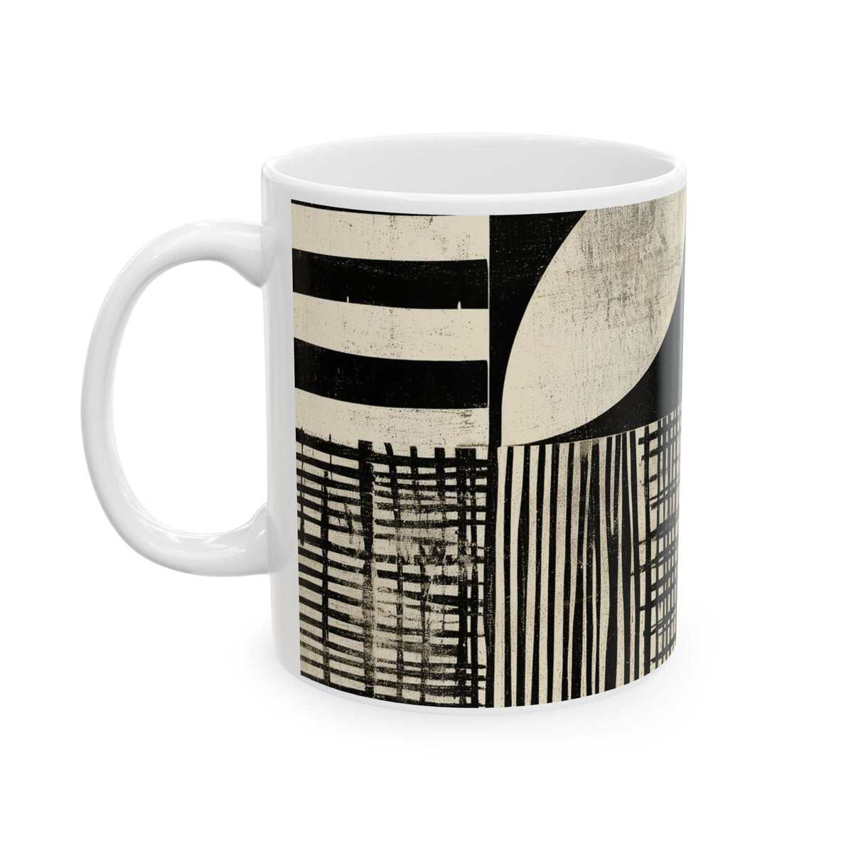 Left handle view of a 11 oz white ceramic mug featuring a modern abstract geometric print in black and cream, showcasing stripes, textured blocks, and a curved shape, set against a plain white background.