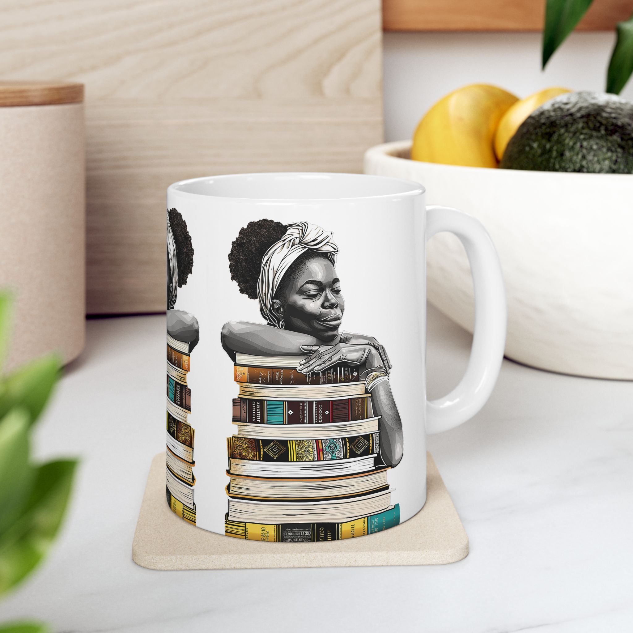 White coffee mug featuring an Afrocentric illustration of a peaceful Black woman embracing books, symbolizing education, knowledge, freedom, and generational legacy.