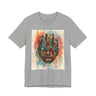 Afrocentric graphic t-shirt featuring an abstract African mask blended with the New York City skyline in a colorful watercolor style design celebrating Black culture and NYC pride.