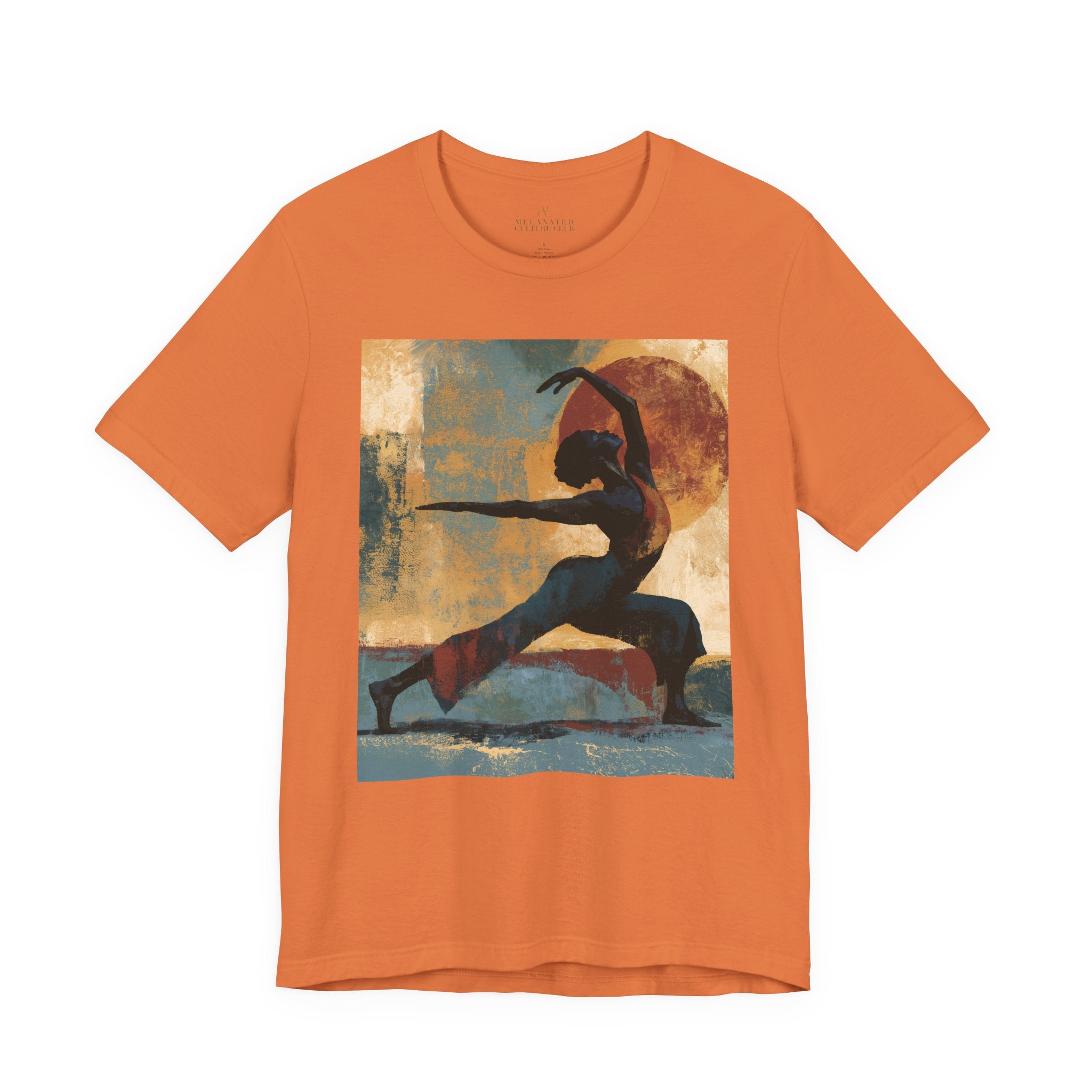 A burnt orange colored short-sleeve crewneck t-shirt featuring a Black woman in a yoga pose against a warm, abstract sunset background.