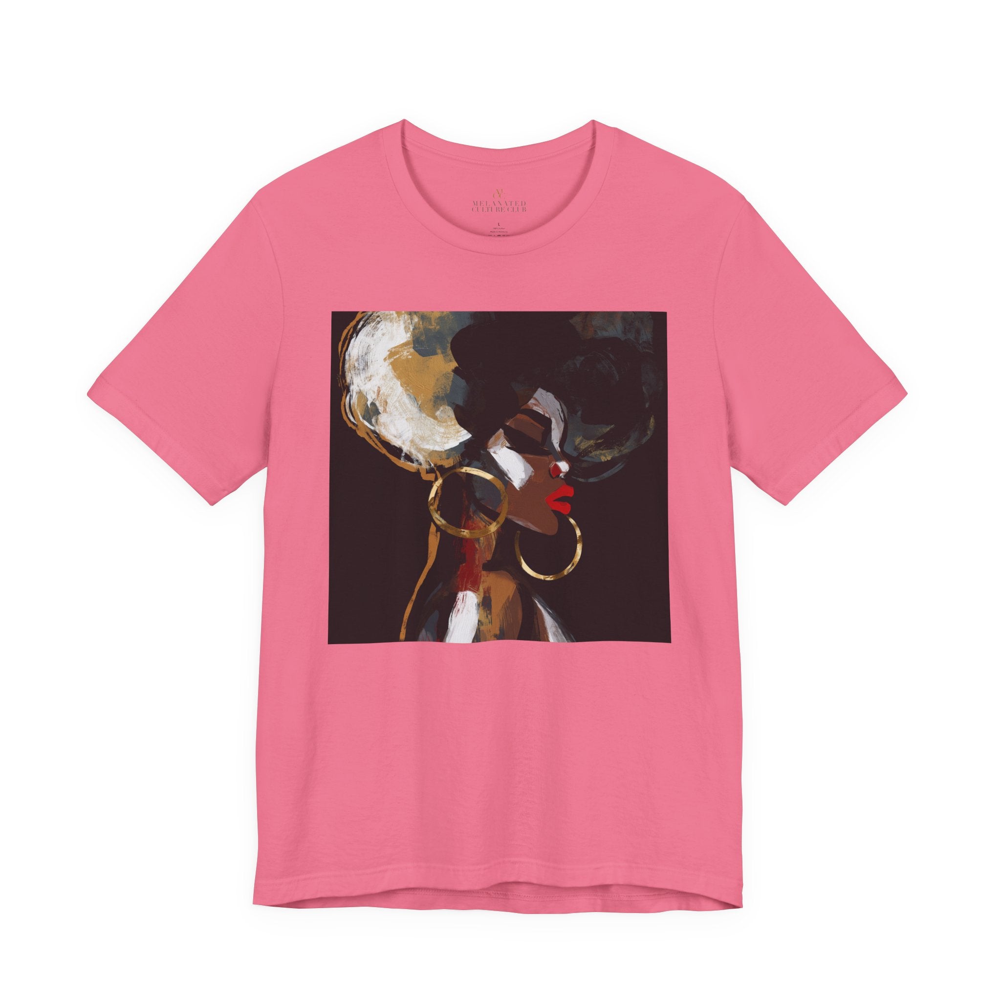 A pink short-sleeve crewneck t-shirt featuring a square graphic print of an artistic portrait of a Black woman with high-cropped hair, gold hoop earrings, and red lipstick on a dark background.