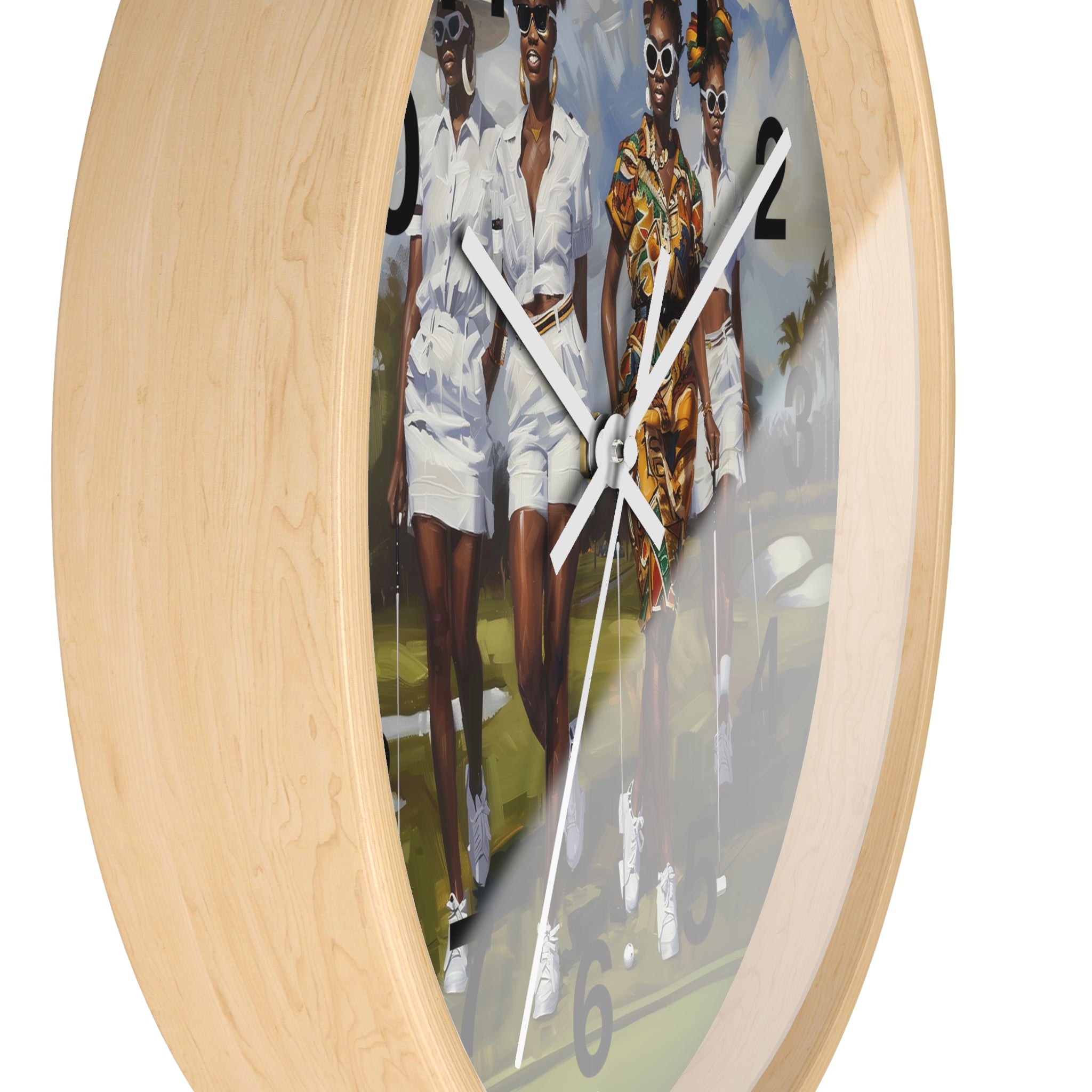 Round wall clock with a light natural wood frame and a printed art face showing three stylishly dressed women walking outdoors. The clock has large black numerals and white hands.