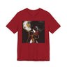 A mustard yellow short-sleeve crewneck t-shirt featuring a square graphic print of an abstract portrait of a Black woman with large hoop earrings on a black background.