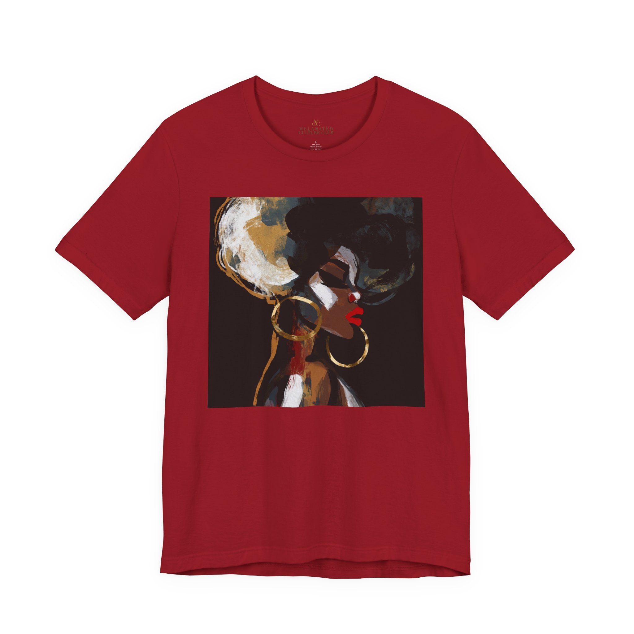 A mustard yellow short-sleeve crewneck t-shirt featuring a square graphic print of an abstract portrait of a Black woman with large hoop earrings on a black background.