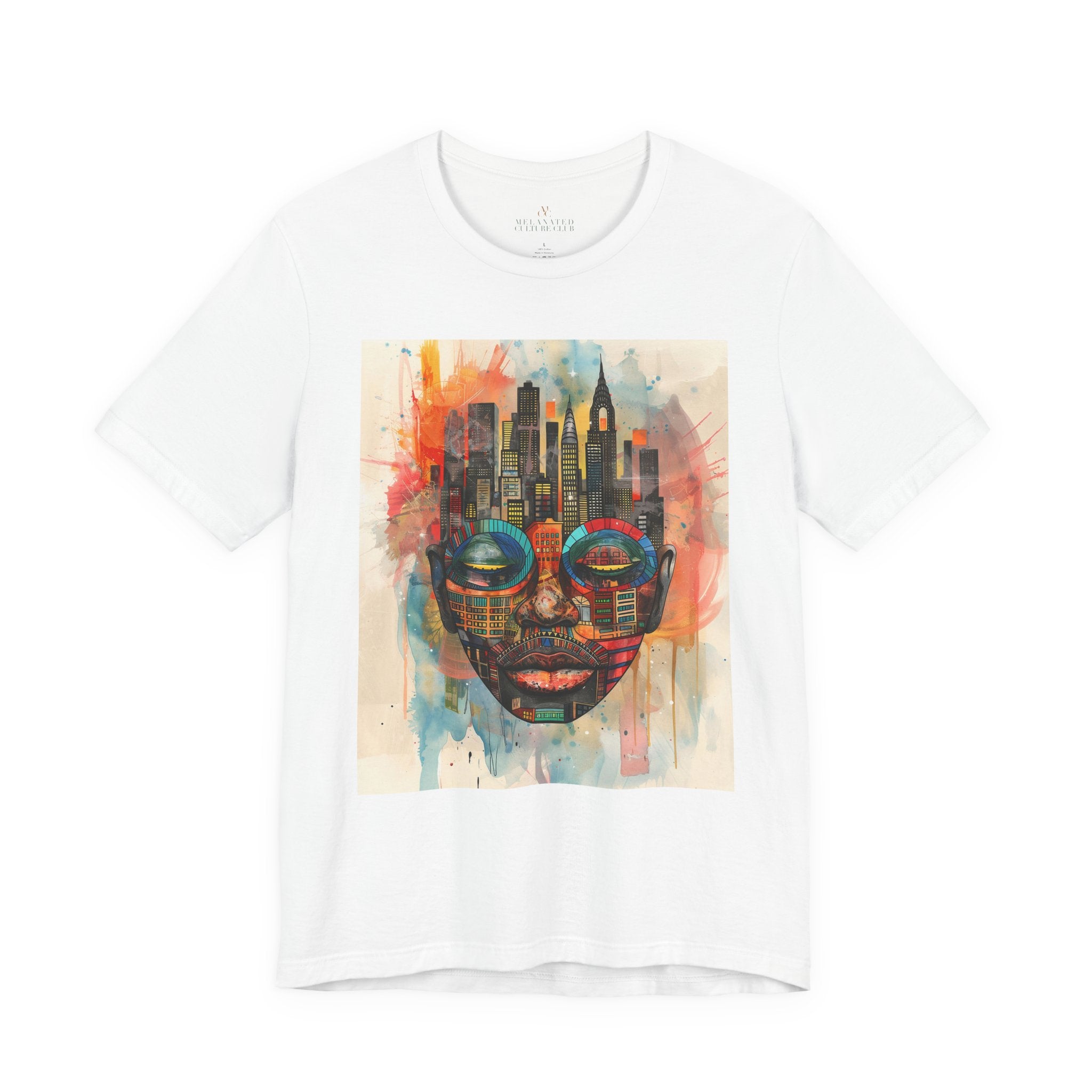 Afrocentric graphic t-shirt featuring an abstract African mask blended with the New York City skyline in a colorful watercolor style design celebrating Black culture and NYC pride.
