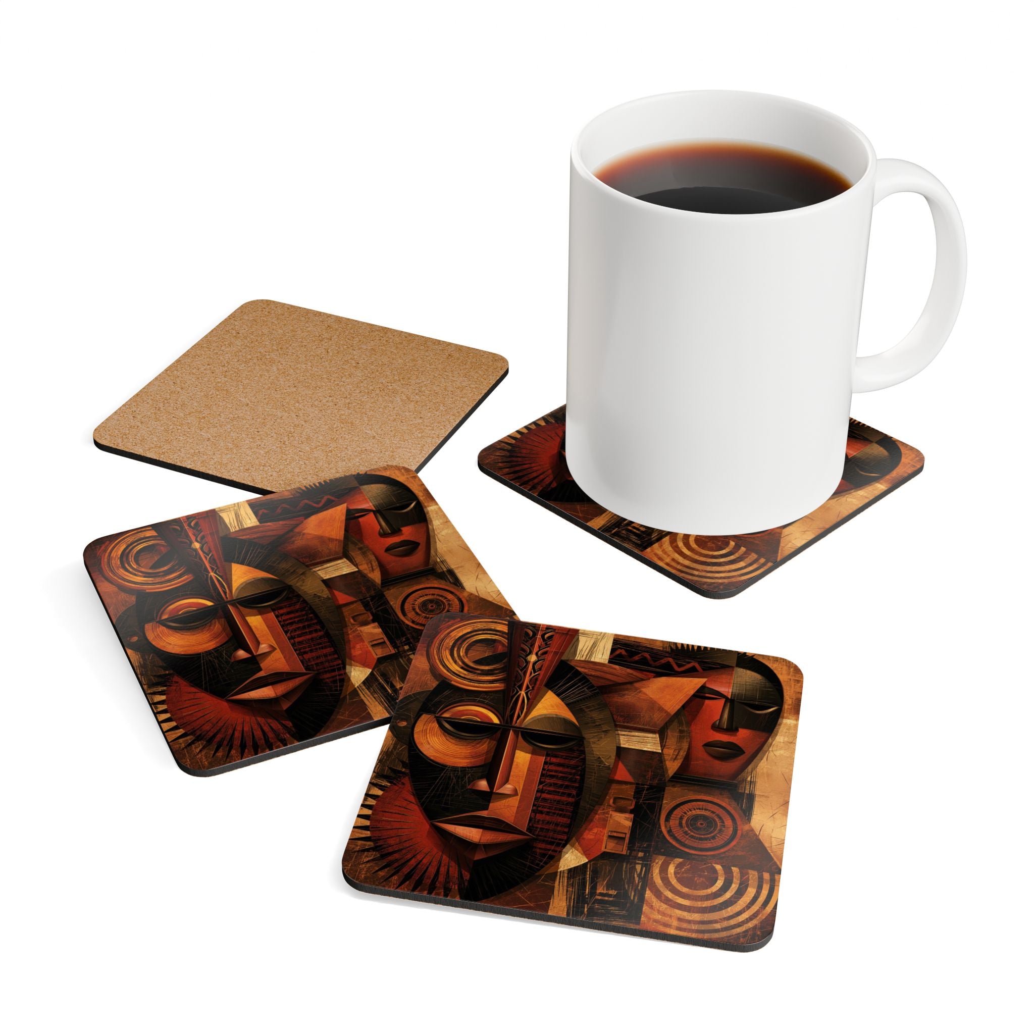 Set of 4 African Mask coasters, with one flipped over to reveal the cork backing.  A white coffee mug is placed on one of the coasters.