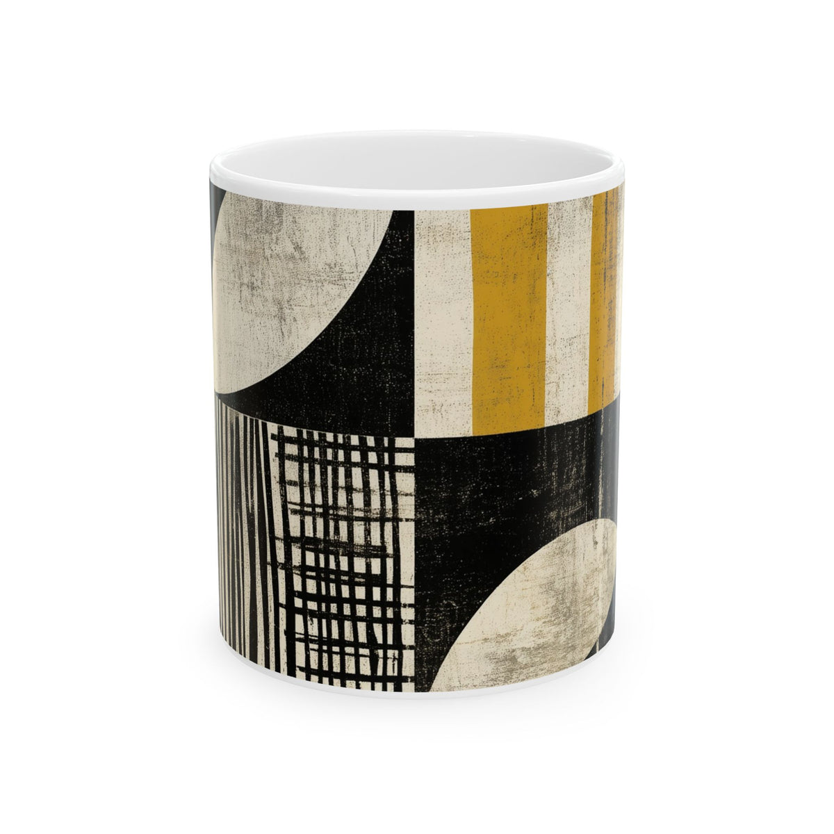 Front view of a 11 oz white ceramic mug with a modern abstract geometric pattern featuring black, cream, and mustard yellow blocks, lines, and curved shapes, shown on a plain white background.