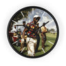 A round wall clock with a black frame and a printed golf course scene on the face. The artwork shows several men on a golf course, with one man in the foreground wearing a colorful patterned shirt, white pants, and a white cap.