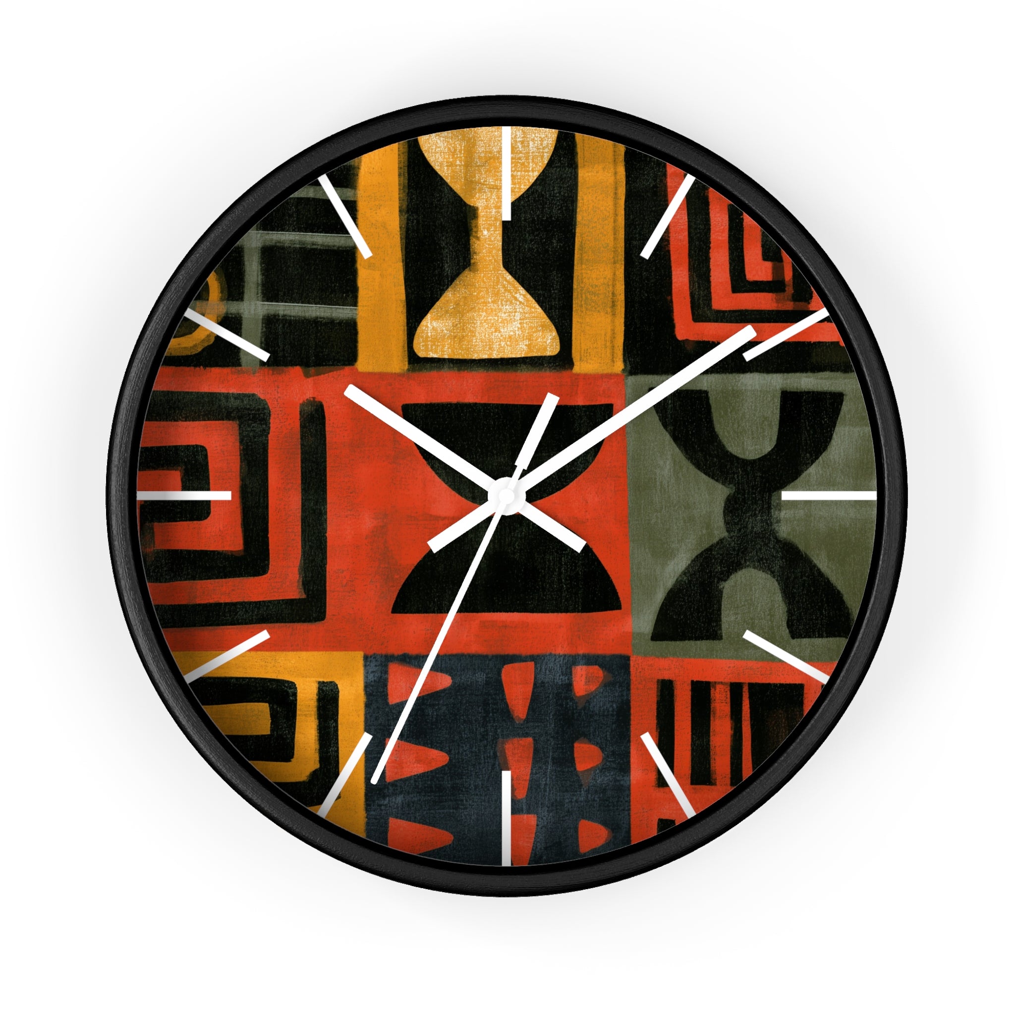 Black Afrocentric abstract geometric round wall clock with white time markings and black clock hands, featuring African-inspired symbols, spirals, arches, stripes, and graphic patterns in red, black, mustard gold, charcoal, and earthy gray, displayed against a white background.