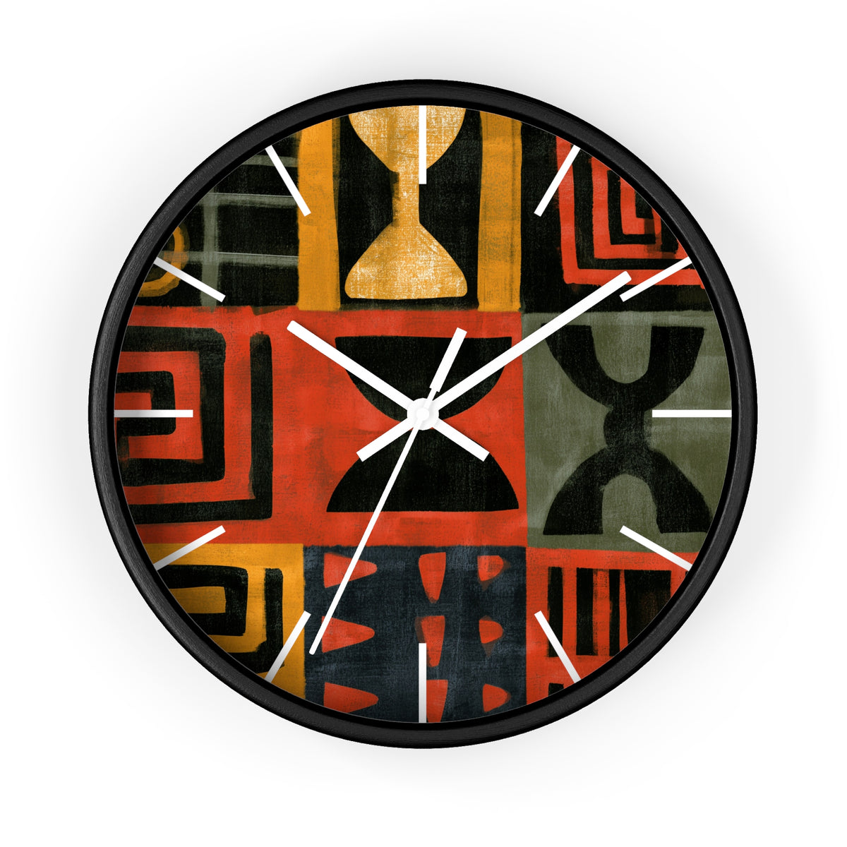 Black Afrocentric abstract geometric round wall clock with white time markings and black clock hands, featuring African-inspired symbols, spirals, arches, stripes, and graphic patterns in red, black, mustard gold, charcoal, and earthy gray, displayed against a white background.