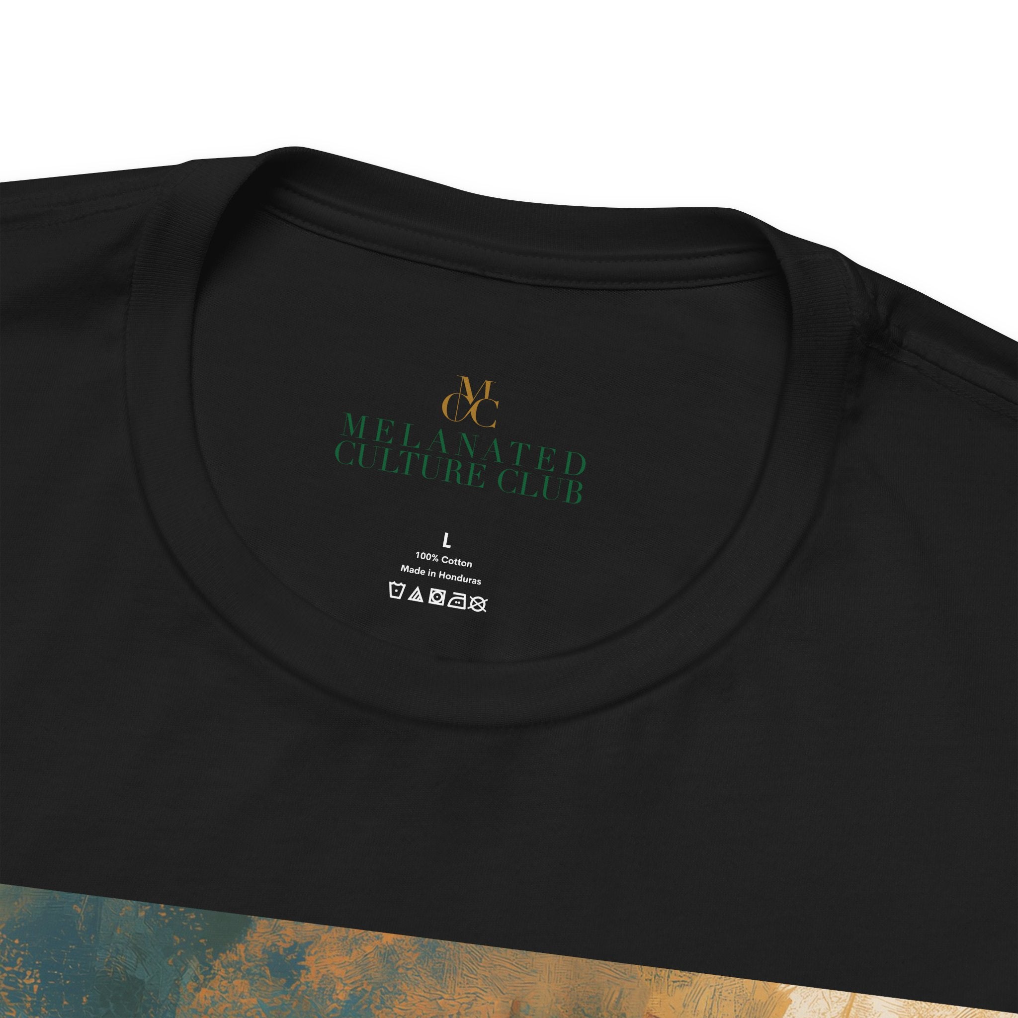 Close up view of the inner label of a black colored short-sleeve crewneck t-shirt.