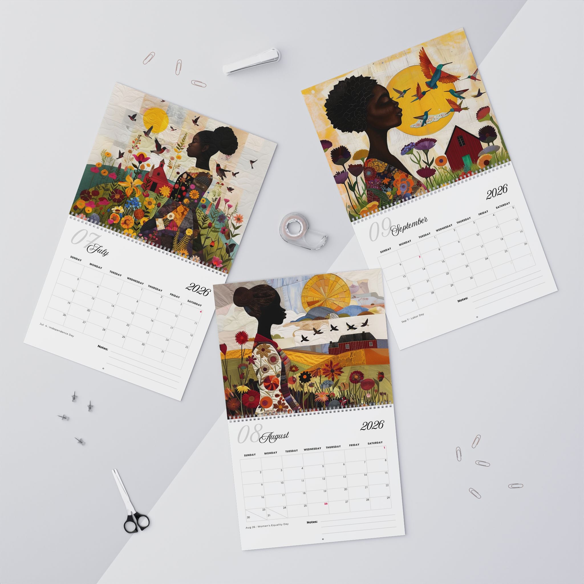 2026 Field of Flowers Wall Calendar featuring Afrocentric art of African American women in fields of wildflowers, created in a 3D quilt-like patchwork illustration style.
