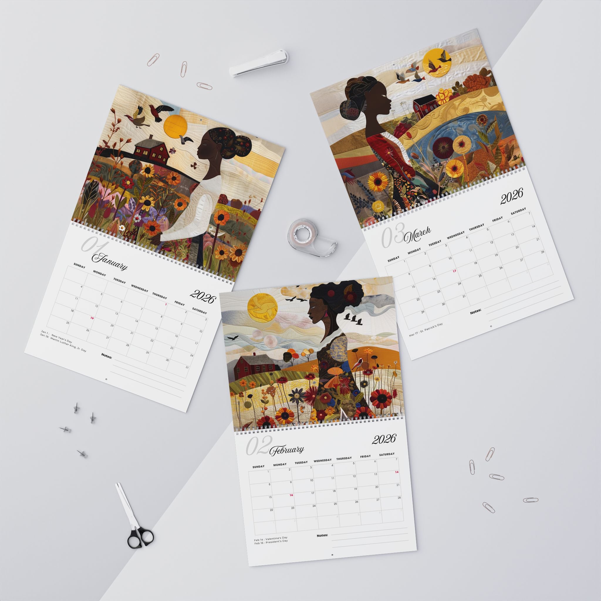2026 Field of Flowers Wall Calendar featuring Afrocentric art of African American women in fields of wildflowers, created in a 3D quilt-like patchwork illustration style.
