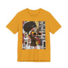 Best Seller Boss Babe graphic tee featuring an abstract cartoon-style Black woman, Lakendra with large round pop-art style sunglasses. The design has a vibrant, graffiti-inspired aesthetic that celebrates African American beauty, confidence, and urban art style.