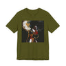 An olive green short-sleeve crewneck t-shirt featuring a square graphic print of an artistic portrait of a Black woman with large gold hoop earrings, red lipstick, and dark hair against a black background.