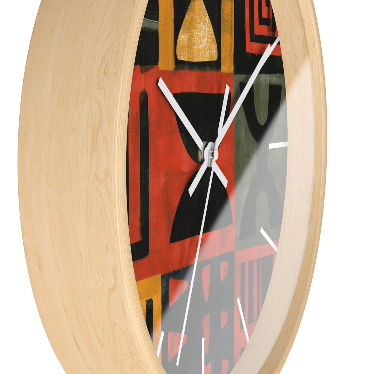 Side view of faux oak wood Afrocentric abstract geometric round wall clock with white time markings and black clock hands, featuring African-inspired symbols, spirals, arches, stripes, and graphic patterns in red, black, mustard gold, charcoal, and earthy gray, displayed against a white background.