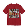 A bright red short-sleeve crewneck t-shirt featuring a large rectangular graphic print on the front with the word 'Fabulous' in gold letters over a collage of images featuring a stylized Black female.