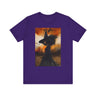Afrocentric Black Witch T-Shirt featuring a watercolor illustration of an African American witch with black bats flying across a dark moody background. Unisex Halloween graphic tee with Afrocentric gothic design.