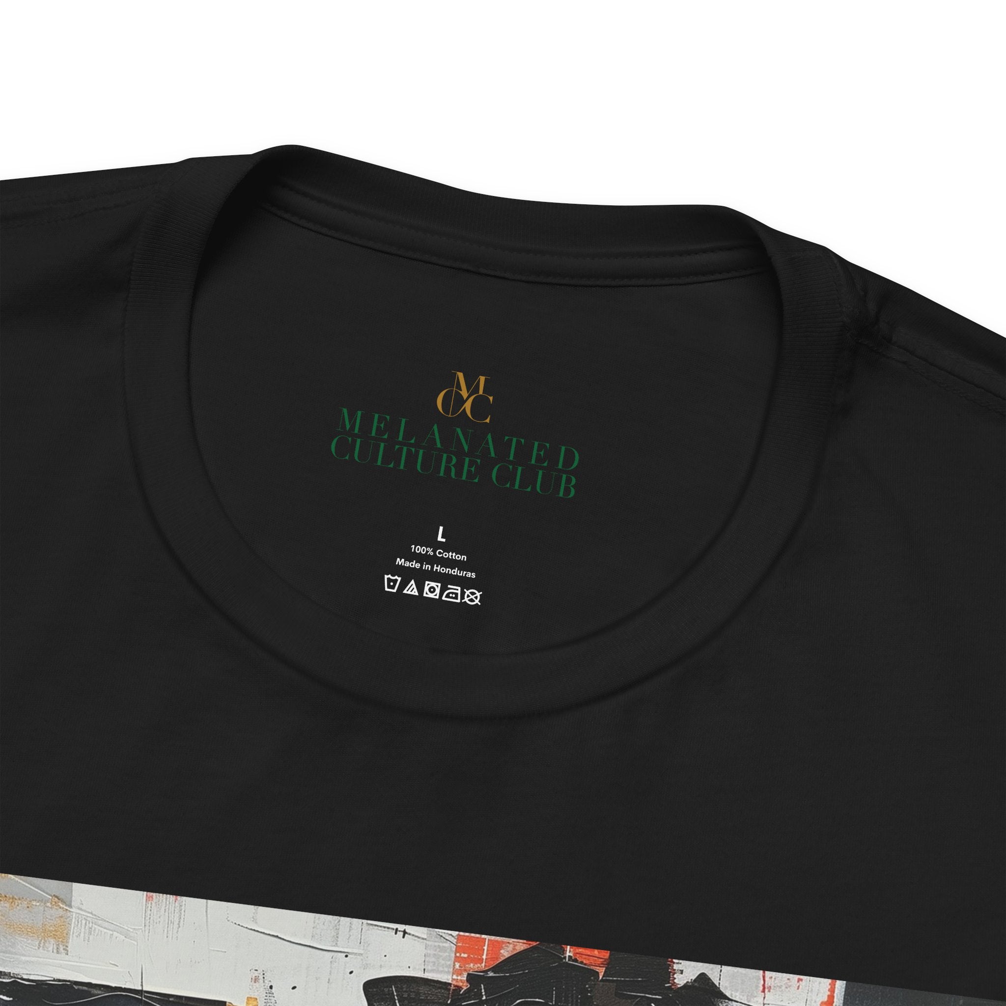 Close up view of inner label on Boss Babe Kendra abstract graffiti T-shirt in black against a white background.