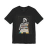 Afrocentric graphic tee shirt featuring a peaceful Black woman embracing a stack of books, symbolizing education, knowledge, freedom, and generational legacy.