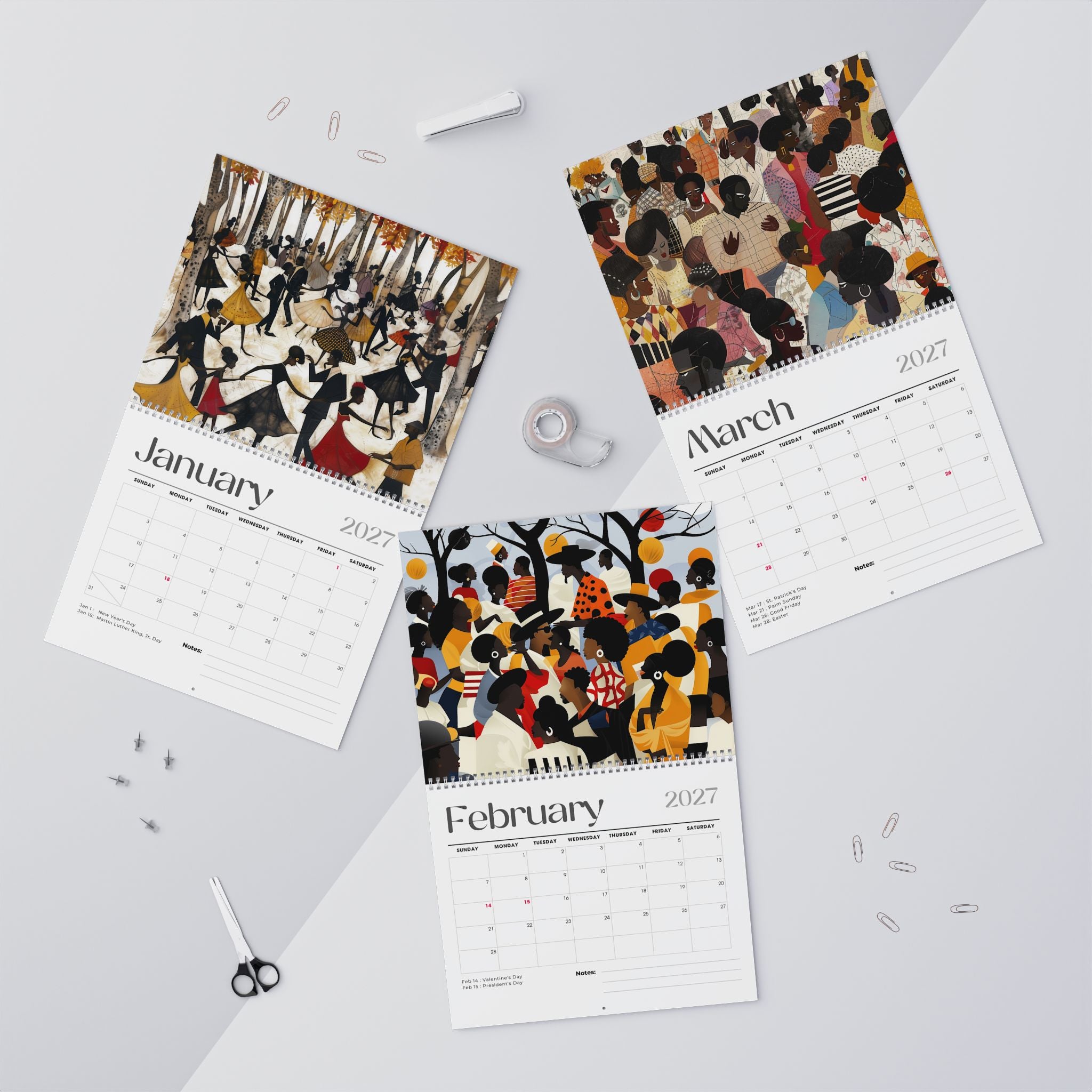 Picnic in the Park featuring the monthly calendar pages for January, February, and March 2027 are arranged on a light gray surface with small stationery props around them.