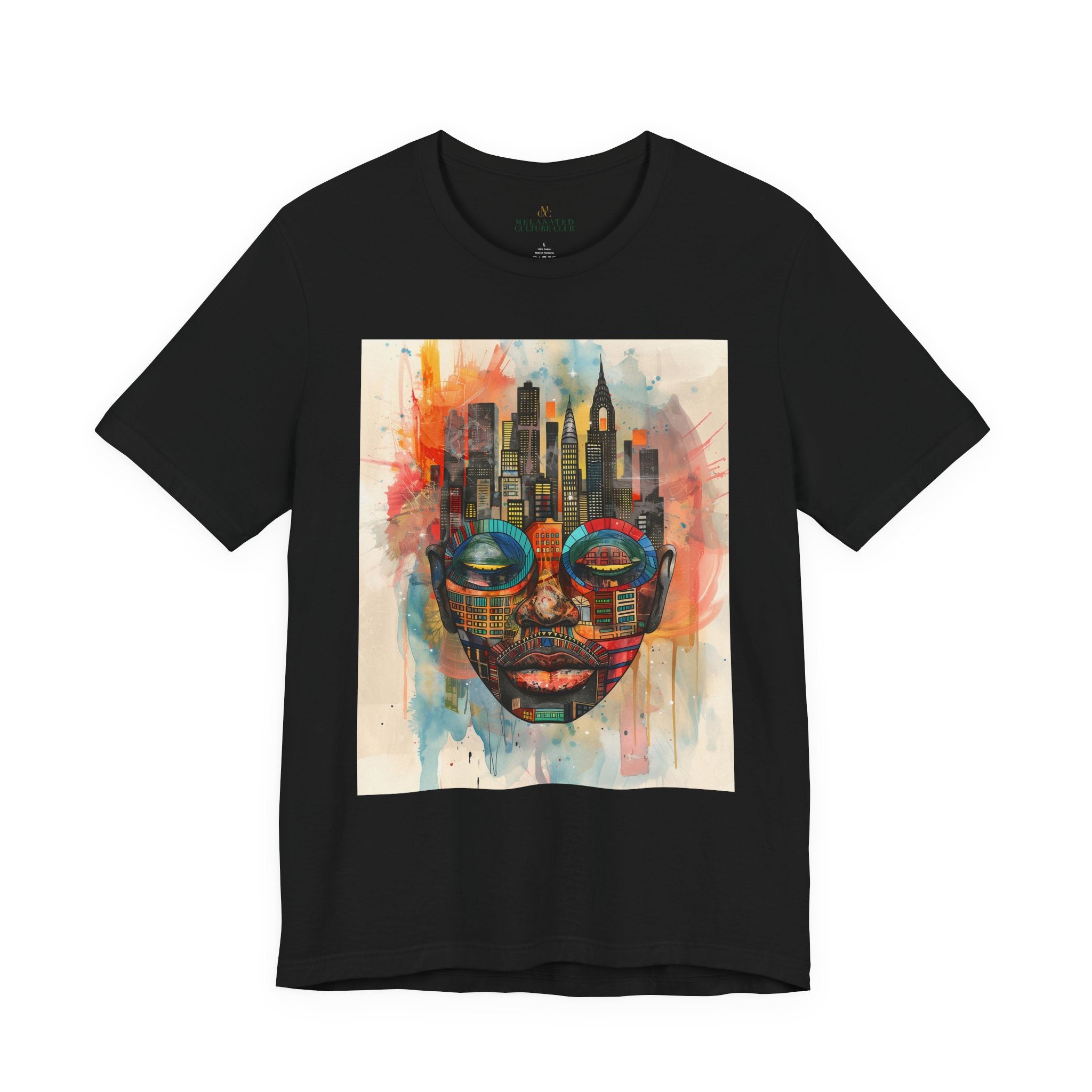 Afrocentric graphic t-shirt featuring an abstract African mask blended with the New York City skyline in a colorful watercolor style design celebrating Black culture and NYC pride.
