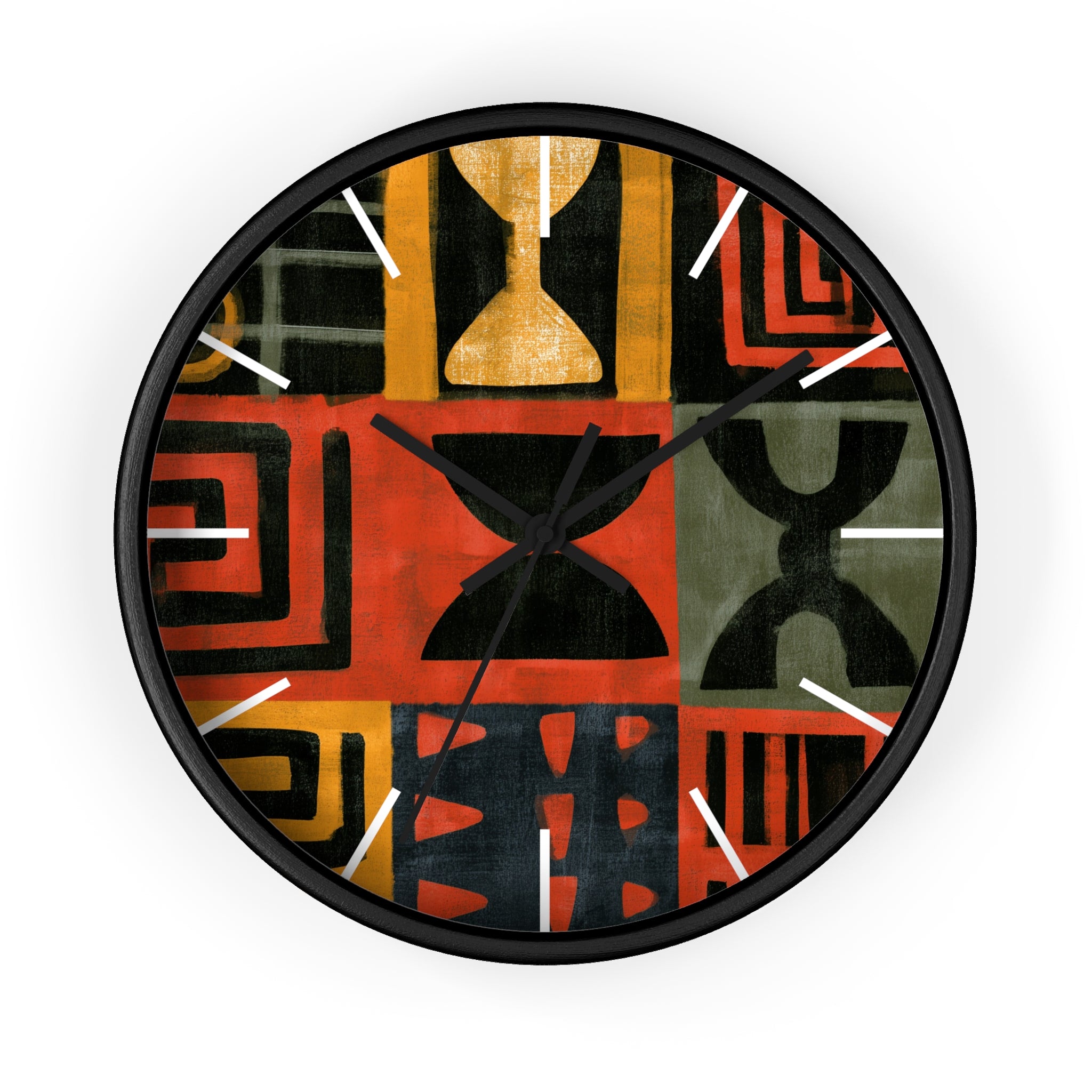 Black Afrocentric abstract geometric round wall clock with white time markings and black clock hands, featuring African-inspired symbols, spirals, arches, stripes, and graphic patterns in red, black, mustard gold, charcoal, and earthy gray, displayed against a white background.