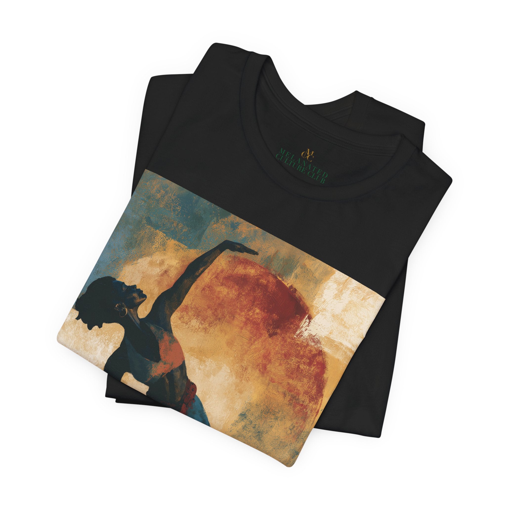 Close up view of the a folded black colored short-sleeve crewneck t-shirt.
